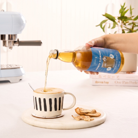 Irish cream zero sugar syrup being poured into a coffee