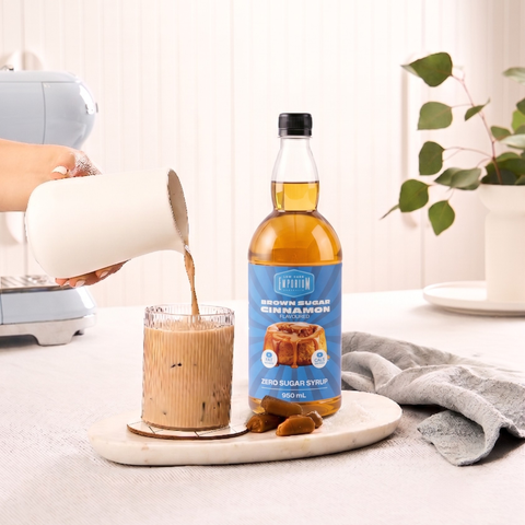 Brown sugar cinnamon zero sugar syrup beside a coffee